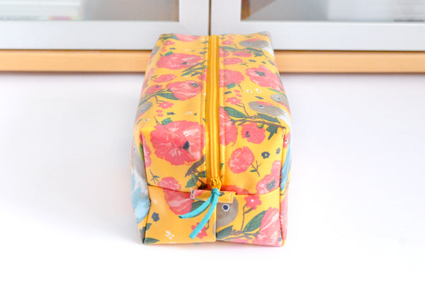 Yellow Birdy Laminated Boxy Toiletry Bag